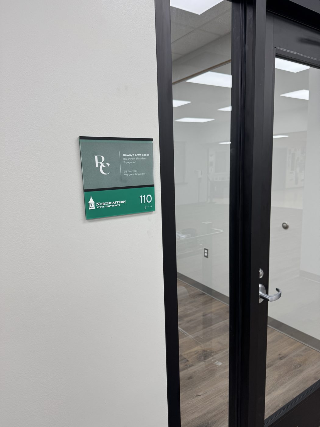 Branded suite sign