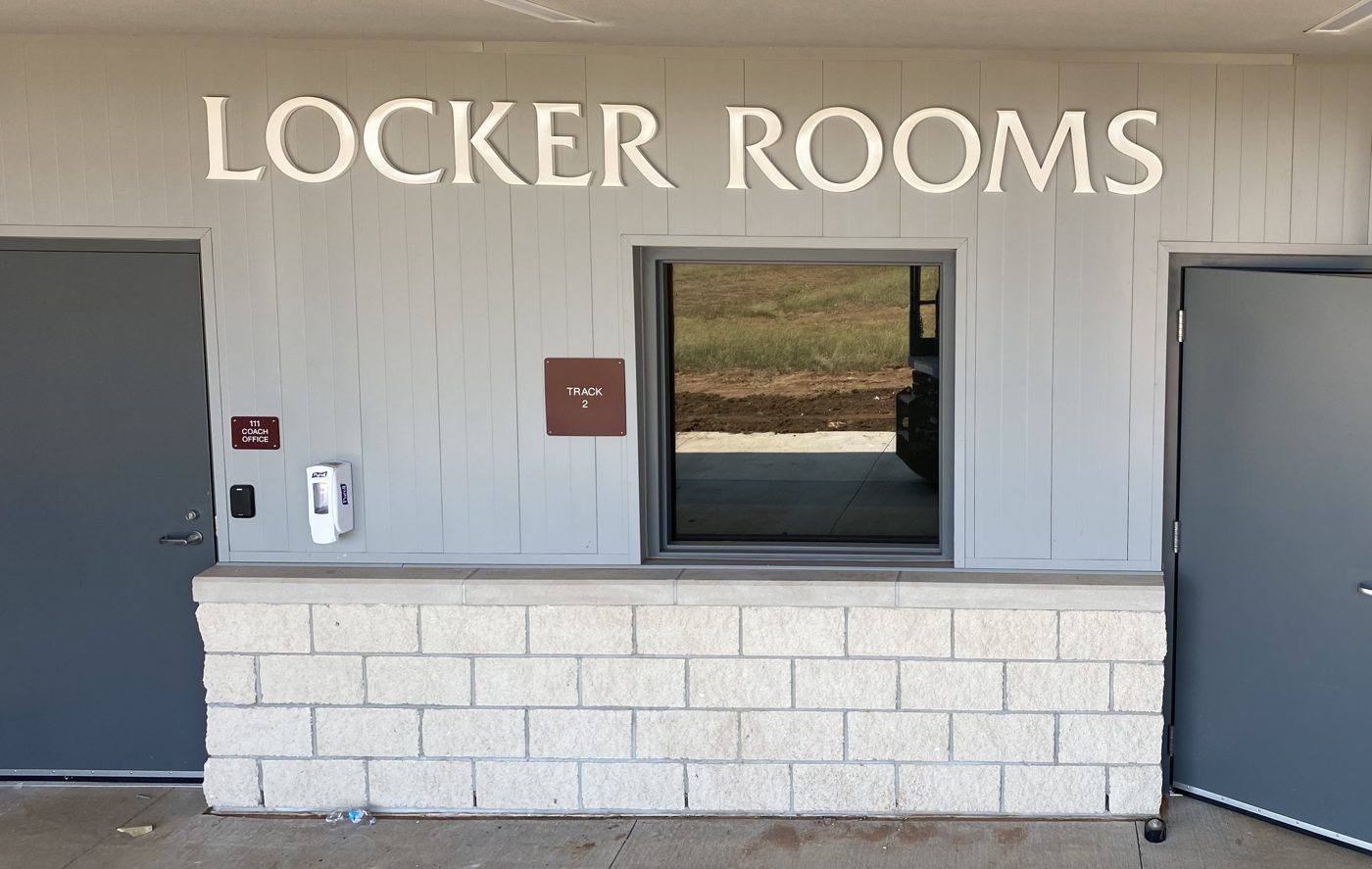 Dimensional letters with ADA room signs