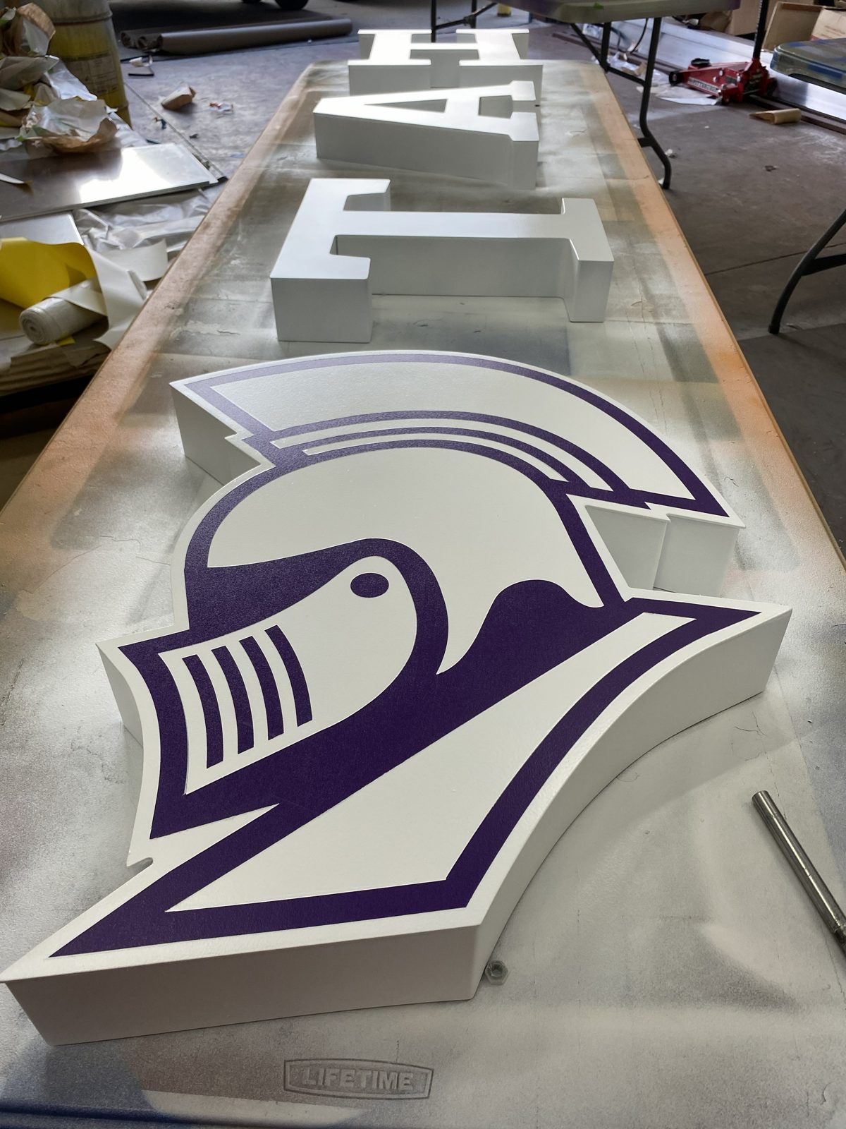 Layered dimensional mascot ready to mount